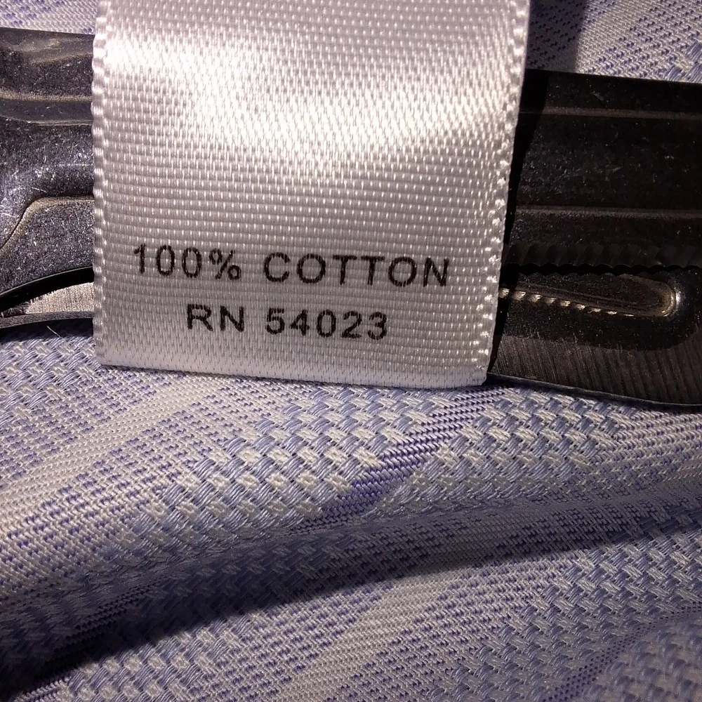 A Banana Republic men's long sleeve button-down dress shirt blue with stripes